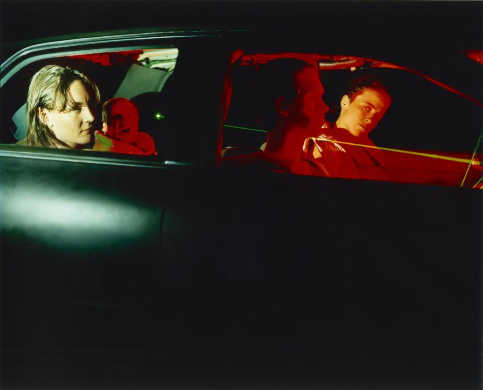 Two people sitting in a car